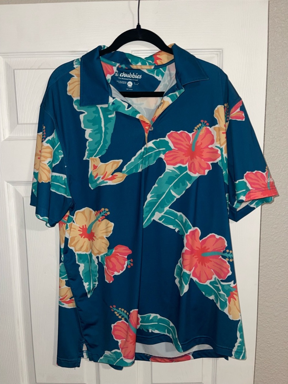 chubbies Teal Floral Hawaiian Camp Shirt with Coral and Yellow Blooms